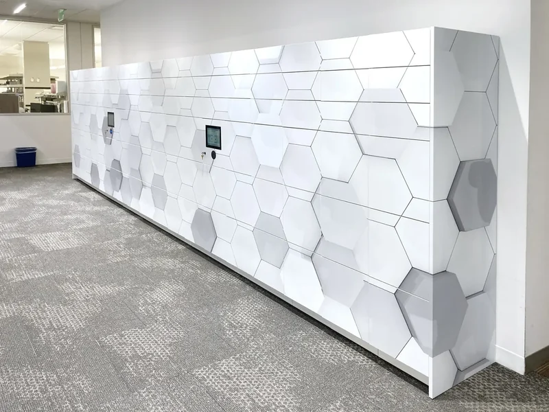 White locker bank with a geometric graphic wrap