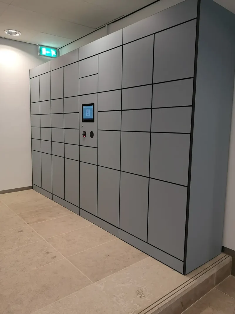 Grey parcel lockers with mixed compartment sizes